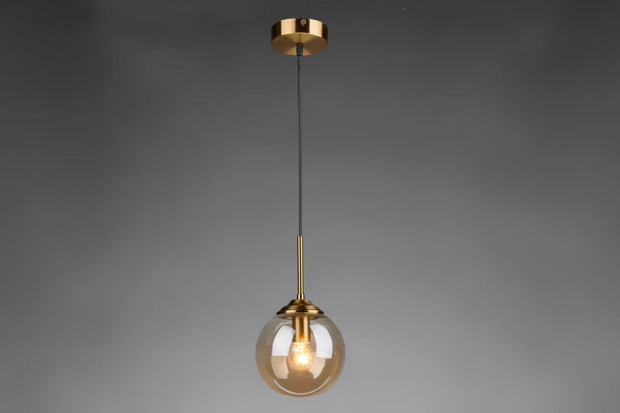 Éclat — Suspension design en verre ambré, lumière chaleureuse & élégante